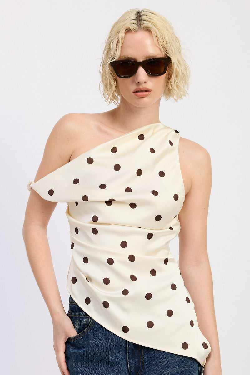 Māre Lunares asymmetrical top in ivory and brown combo, front view showcasing unique design and fabric details.